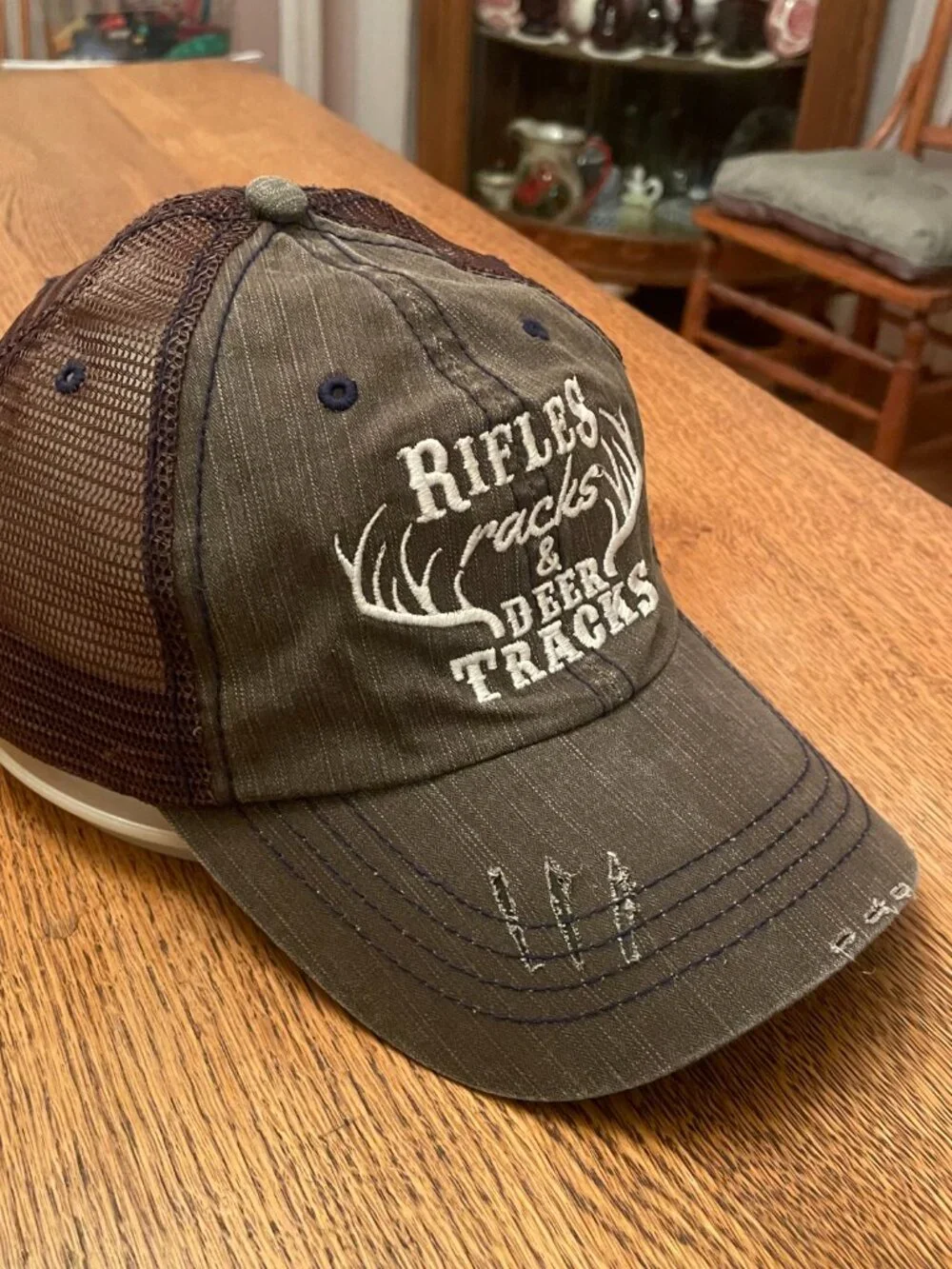Rifles Racks and Deer Tracks Dark Olive/Brown Hook and Loop Trucker Hat Cap